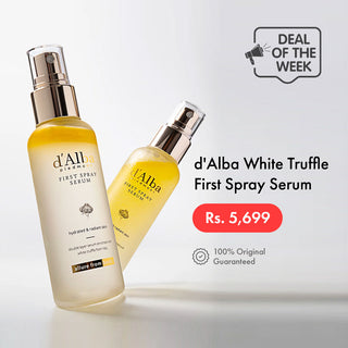 Two bottles of d'Alba White Truffle First Spray Serum with a price tag on a light gray background.