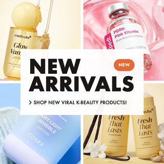 A promotional collage for K-beauty products with a large central text banner reading 'NEW ARRIVALS' and a small 'NEW' badge. Surrounding the banner are four product photos: a gold Medicube Glow Vanishing Mirror bottle, a pink PDRN Pink Vitamin ampoule, a blue COSRX AiryLight Invisible Sun Stick, and two gold Fresh That Lasts moisturizers with vanilla beans and flowers.